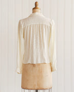 Crèmekleurige rayonblouse met brokaat uit de jaren 1940