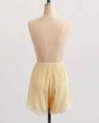 Botergele zijden tapshorts uit de jaren 1930