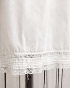 Witte nylon halve onderrok uit de jaren 1960