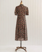 Zwarte midi-jurk met bloemenprint en knoopsluiting uit de jaren 1990