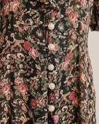 Zwarte midi-jurk met bloemenprint en knoopsluiting uit de jaren 1990